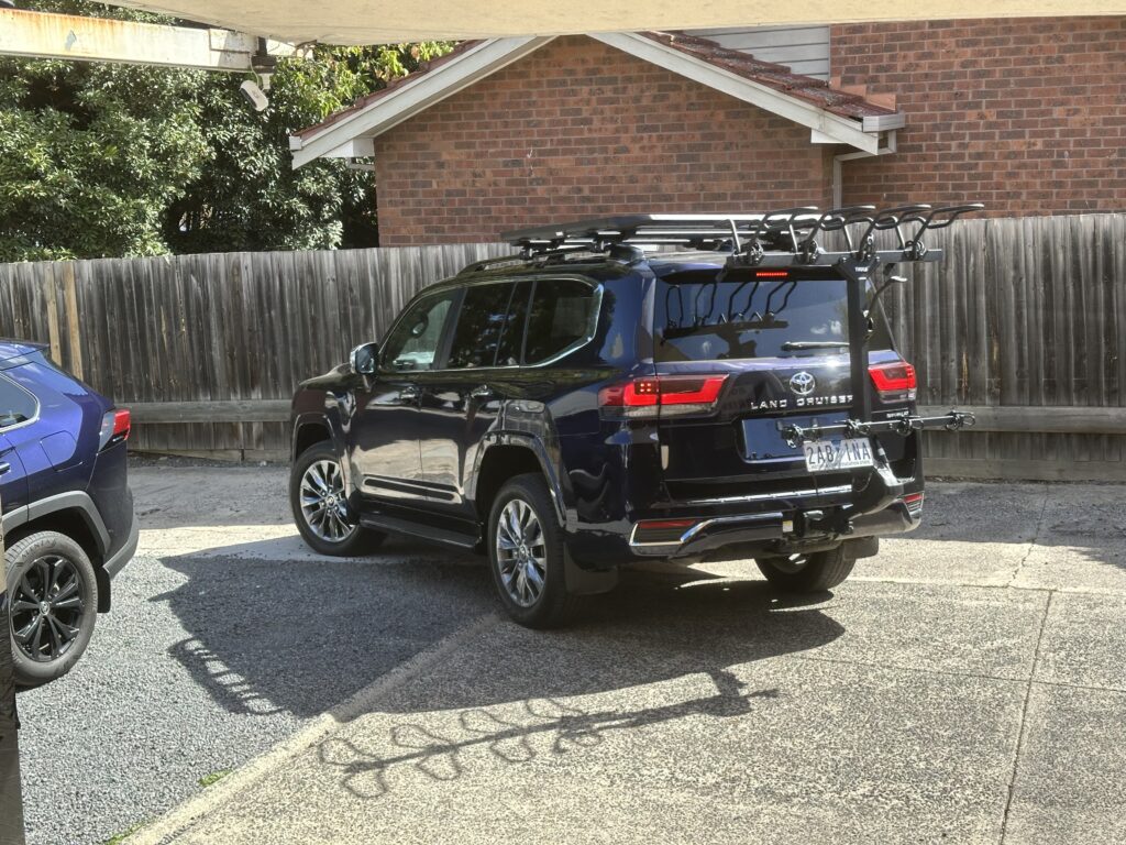 Toyota 300 Series with Thule Caprock & Thule Revert Shingleback PRO - 6 Bike Vertical Bike Rack Carrier